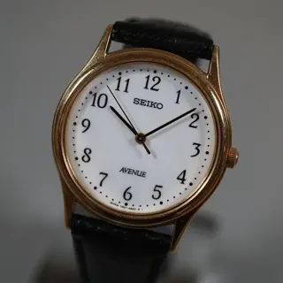 Seiko Avenue 7N01-6490 Gold Tone White Numeral Dial Quartz Dress Watch - $70
