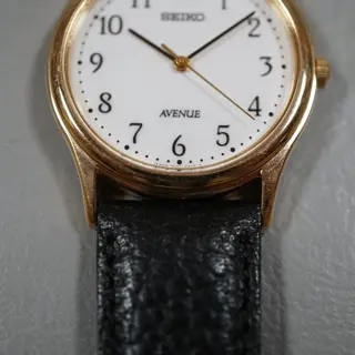 Seiko Avenue 7N01-6490 Gold Tone White Numeral Dial Quartz Dress Watch - $70