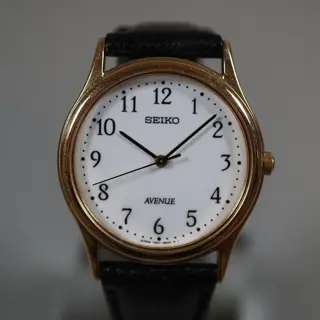 Seiko Avenue 7N01-6490 Gold Tone White Numeral Dial Quartz Dress Watch - $70