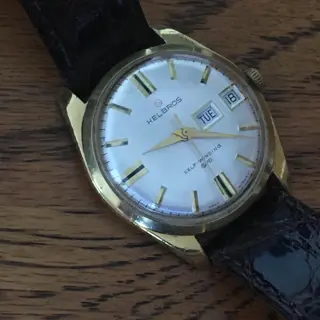Vintage beauties from Oris, Omega, and Helbros, and an aventurine, jump-hour Sugess