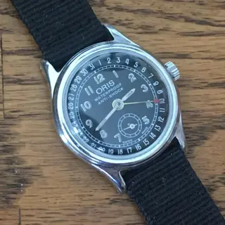 Vintage beauties from Oris, Omega, and Helbros, and an aventurine, jump-hour Sugess