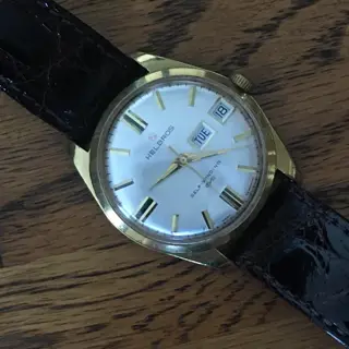 Vintage beauties from Oris, Omega, and Helbros, and an aventurine, jump-hour Sugess