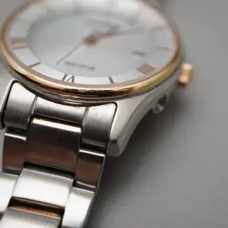 Citizen Collection ES0002-57A Rose Gold Two Tone Solar Quartz Ladies Watch - $75