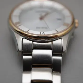 Citizen Collection ES0002-57A Rose Gold Two Tone Solar Quartz Ladies Watch - $75
