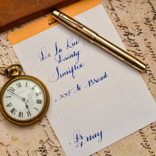 Vintage De La Rue Onoto Dainty Rolled Gold Fountain pen with a Semiflex XXF 14c gold nib