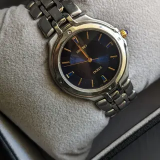 vintage Seiko Dolce SACM067 -with Gilded hands & markers Watch , Iridescent dial & Domed Sapphire , Blue Crown Cabochon price : 330$