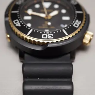 Seiko Prospex SBDN028 V147 Lowercase Limited Black Gold Tuna Solar Quartz Watch - $195