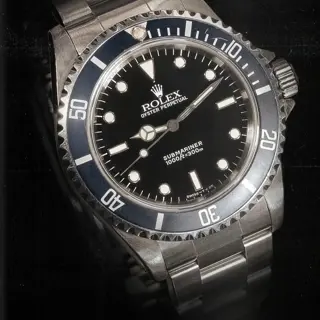 1997 Rolex 14060 Faded Blue Insert Submariner