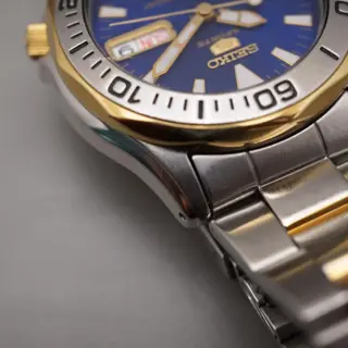 Seiko 5 Sports 7S36-00L0 Blue Dial Two Tone Automatic Watch - $150