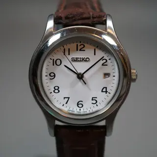 Seiko 7N82-0820 White Numeral Dial Ladies Quartz Watch - $60