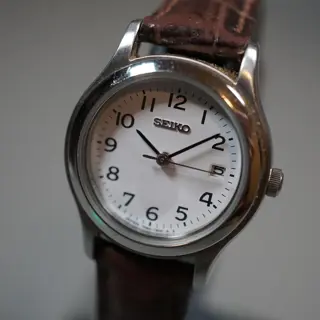 Seiko 7N82-0820 White Numeral Dial Ladies Quartz Watch - $60