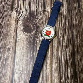 It's Snoopy! Wonderfully whimsical snoopy watch with two suede straps!