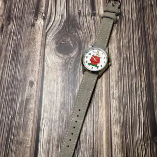 It's Snoopy! Wonderfully whimsical snoopy watch with two suede straps!
