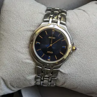 vintage Seiko Dolce SACM067 -with Gilded hands & markers Watch , Iridescent dial & Domed Sapphire , Blue Crown Cabochon price : 140$