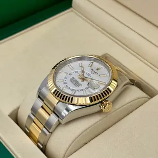 NEW 2025 Rolex Sky-Dweller 42mm 336933 Oyster White Dial - $24,000
