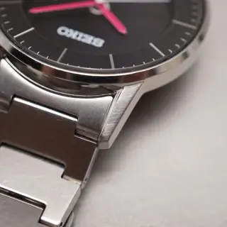 Seiko Spirit V147-0AK0 Black Dial Pink Hands Sector Dial Solar Quartz Watch - $100