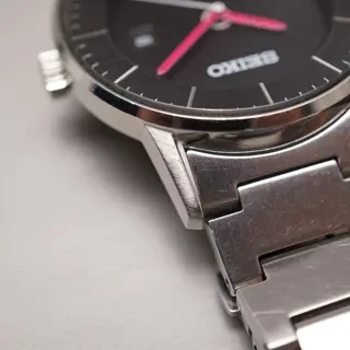 Seiko Spirit V147-0AK0 Black Dial Pink Hands Sector Dial Solar Quartz Watch - $100