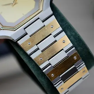 Credor twotone 14kt bezel intergarted bracelet price 400$