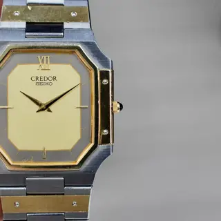 Credor twotone 14kt bezel intergarted bracelet price 400$