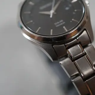 Seiko V137-0CS0 Black Dial Titanium Ladies Solar Quartz - $65
