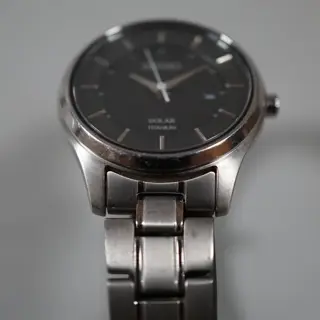 Seiko V137-0CS0 Black Dial Titanium Ladies Solar Quartz - $65