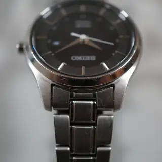 Seiko V137-0CS0 Black Dial Titanium Ladies Solar Quartz - $65