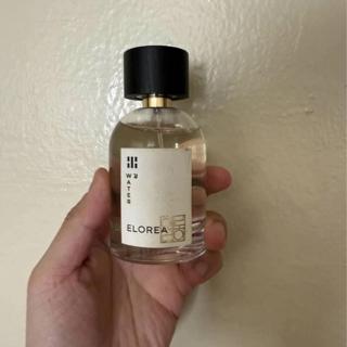 3.4 oz Elorea Water couple sprays missing (Bottle)