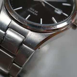 Seiko SNE377 V157 Black Dial Titanium Solar Quartz Watch - $80