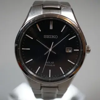 Seiko SNE377 V157 Black Dial Titanium Solar Quartz Watch - $80