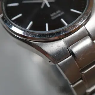 Seiko SNE377 V157 Black Dial Titanium Solar Quartz Watch - $80