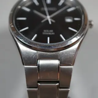 Seiko SNE377 V157 Black Dial Titanium Solar Quartz Watch - $80