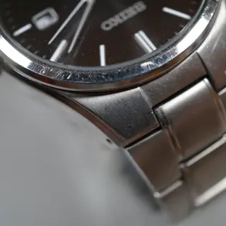 Seiko SNE377 V157 Black Dial Titanium Solar Quartz Watch - $80