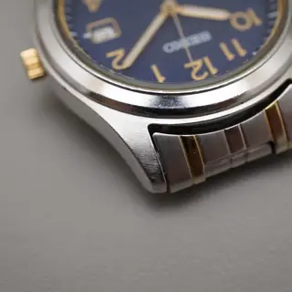 Seiko Spirit SBPN057 V145 Blue Dial Two Tone Solar Quartz Watch - $70