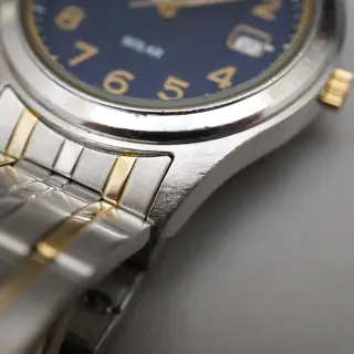 Seiko Spirit SBPN057 V145 Blue Dial Two Tone Solar Quartz Watch - $70