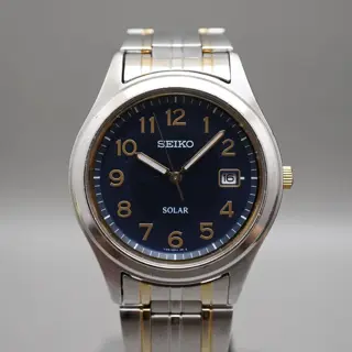 Seiko Spirit SBPN057 V145 Blue Dial Two Tone Solar Quartz Watch - $70
