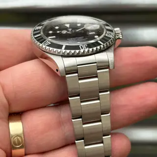 Rolex Submariner Date 40mm Ref.16610 Box & Papers