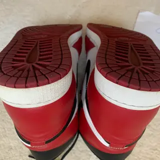 Air Jordan 1 retro high og Chicago (2015) and black toe (2025) used size 11.5