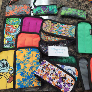 Lots of Rickshaw Coozies and Pouches