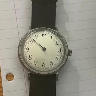 Red Star Solo.   Hand wind mechanical watch with single hand.  7982G-C