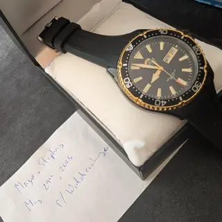 Orient Kamasu black and gold, with strapco oysterflex strap