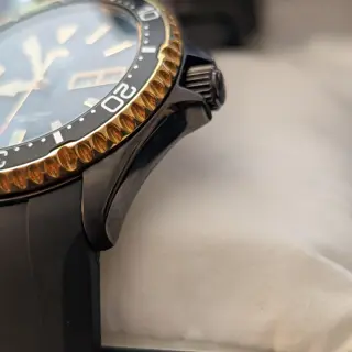 Orient Kamasu black and gold, with strapco oysterflex strap
