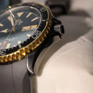 Orient Kamasu black and gold, with strapco oysterflex strap