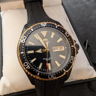 Orient Kamasu black and gold, with strapco oysterflex strap