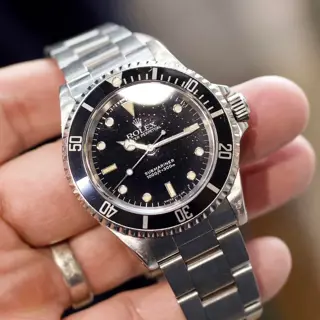 Rolex Submariner ref. 14060 E-Serial 1990 with Papers