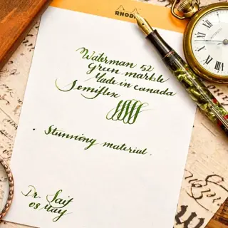 A gorgeous vintage Waterman's 52 Green Red marbled cellulose Semiflex 14c gold F nib