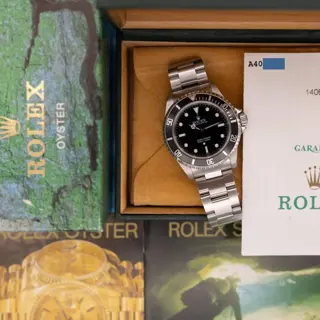 1999 Rolex Submariner Ref. 14060 | Swiss Only Dial | Box and Papers