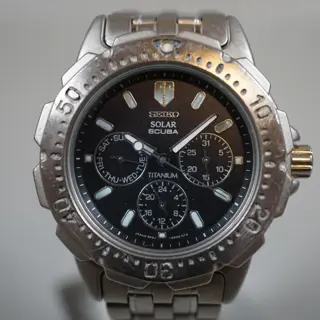 Seiko 5K2J-0A30 Black Dial Scuba 200M Day Date Solar Quartz Watch - $135