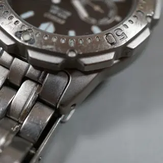 Seiko 5K2J-0A30 Black Dial Scuba 200M Day Date Solar Quartz Watch - $135