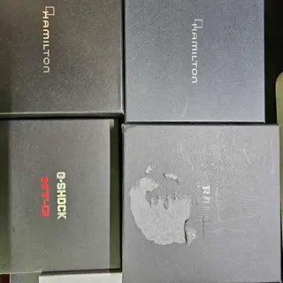 Empty watch boxes, Hamilton (Intra-matic chrono & Ventura Elvis 80), Rado (Captain cook), Oris (Big crown pointer date), Casio (G-shock MTG B2000)