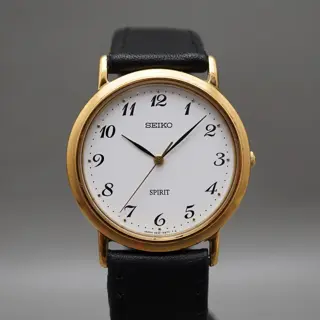 Seiko Spirit 5E21-6000 Gold Tone White Dial Quartz Watch - $70